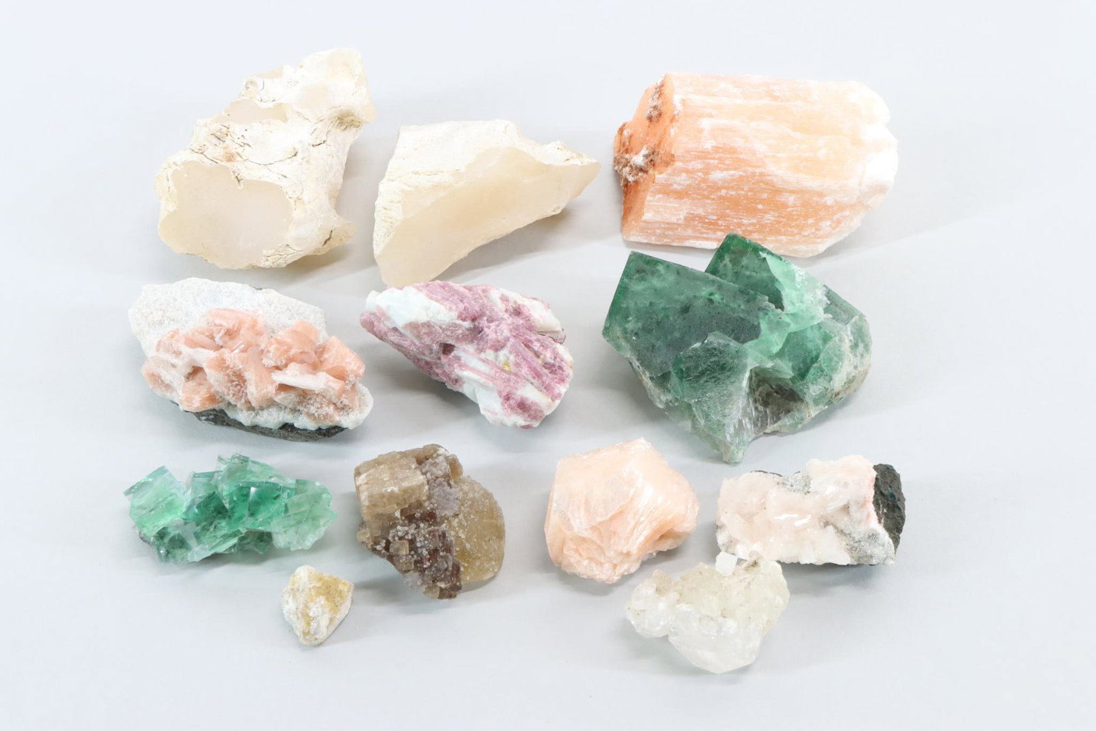 Fluorite & Mineral Specimens: Fluorite specimens including pieces from Waterloo South Quarry, Iowa, China, India. Rough peach selenite crystal (133.2 g) from Morocco, Heulandite with Chalcedony minerals from India, rose Tourmaline