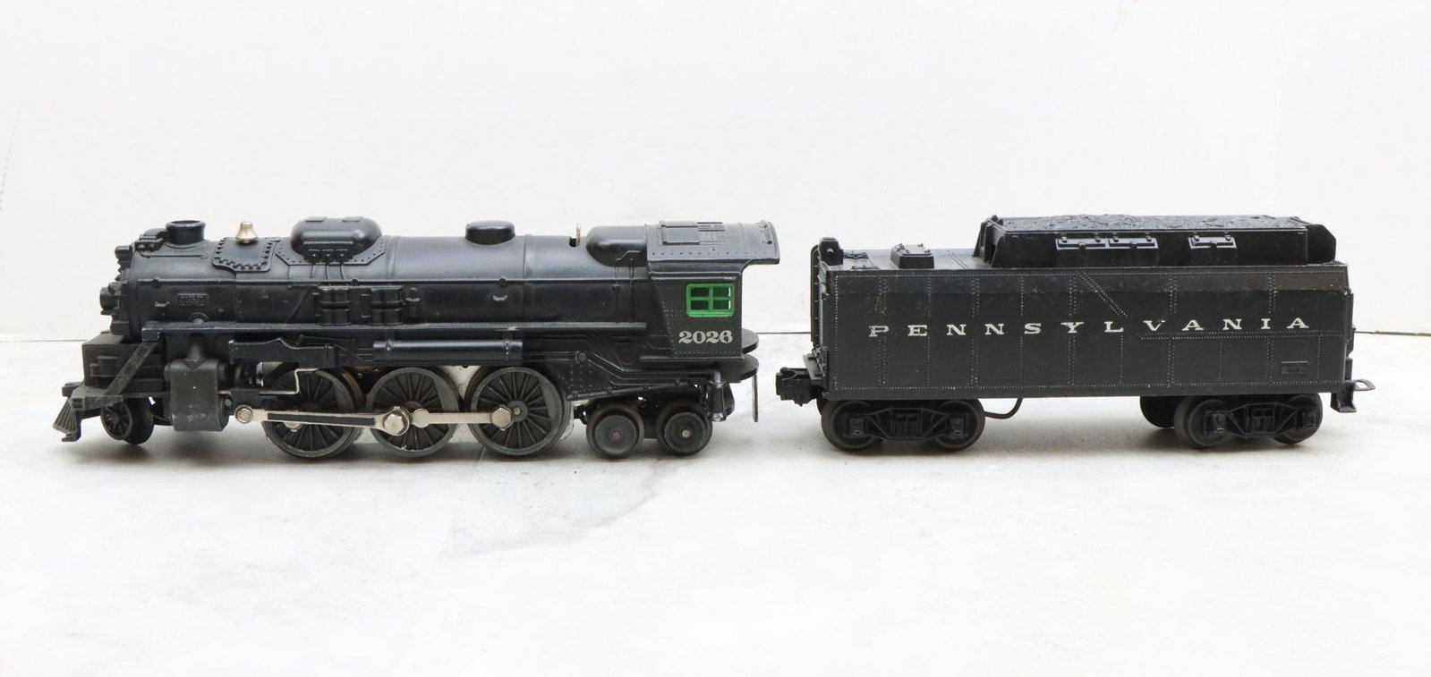 Lionel Trains 2026 Locomotive and PRR Tender: Postwar, O27 gauge, 2-6-4 locomotive 2026, and PRR tender.