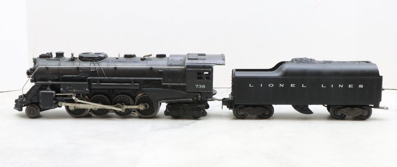 Lionel Trains 736 Locomotive and 2046W Tender: Postwar, O gauge, 2-8-4 locomotive 736, and tender 2046W.