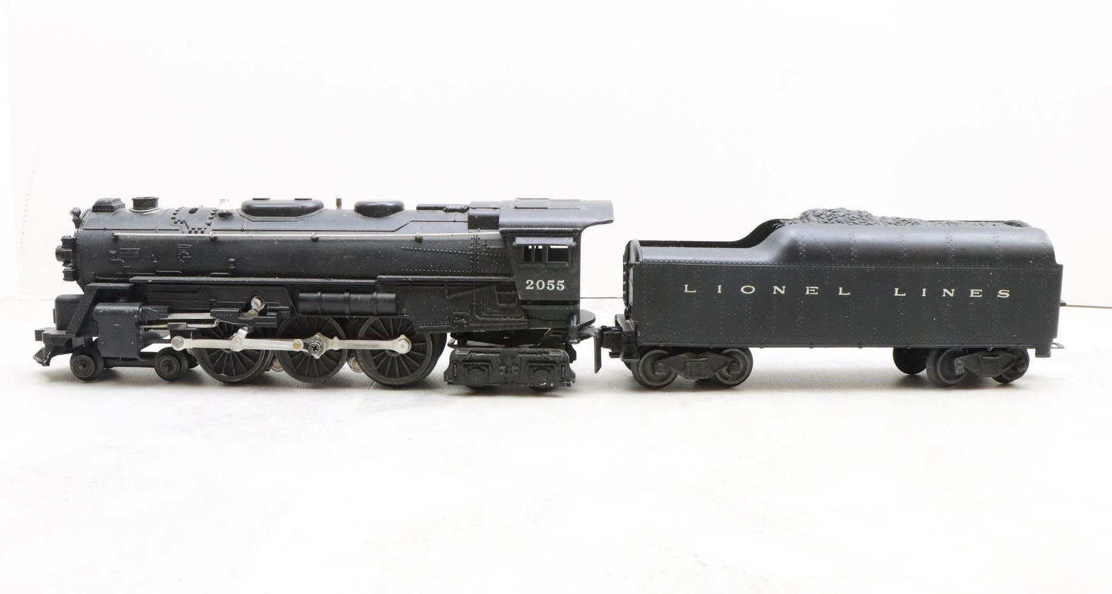 Lionel Trains 2055 Locomotive and Tender: Postwar, O gauge, 4-6-4 locomotive 2055, and unmarked tender.