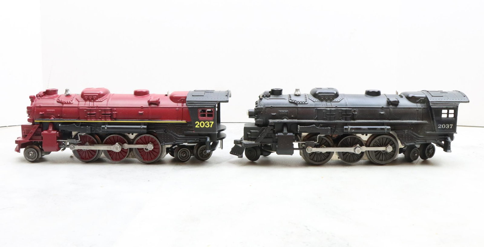 Lionel Trains 2037 Locomotives: Postwar, O27 gauge, 2-6-4 locomotives 237. One has been painted.