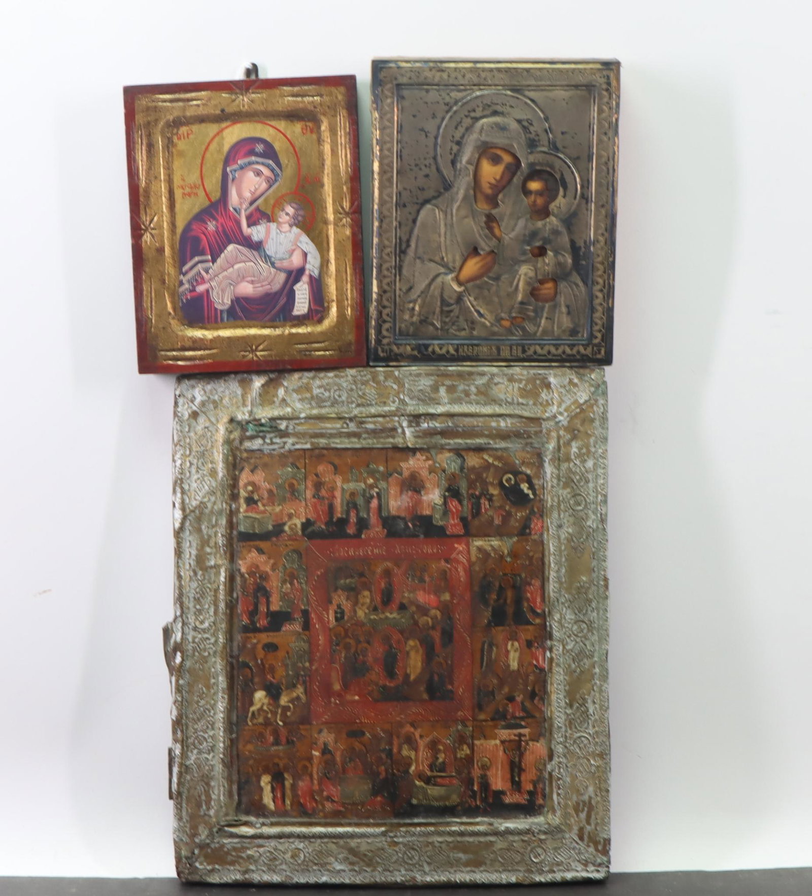 Russian Icons, Theotokos and Life of Christ: 84 zolotniki (875 silver) riza / oklad, post 1908 Moscow kokoshnik, Cyrillic "EK" maker's mark, over tempera on panel, depicting Theotokos Mother and Child, with stamp from the Lithuanian Ministry of 