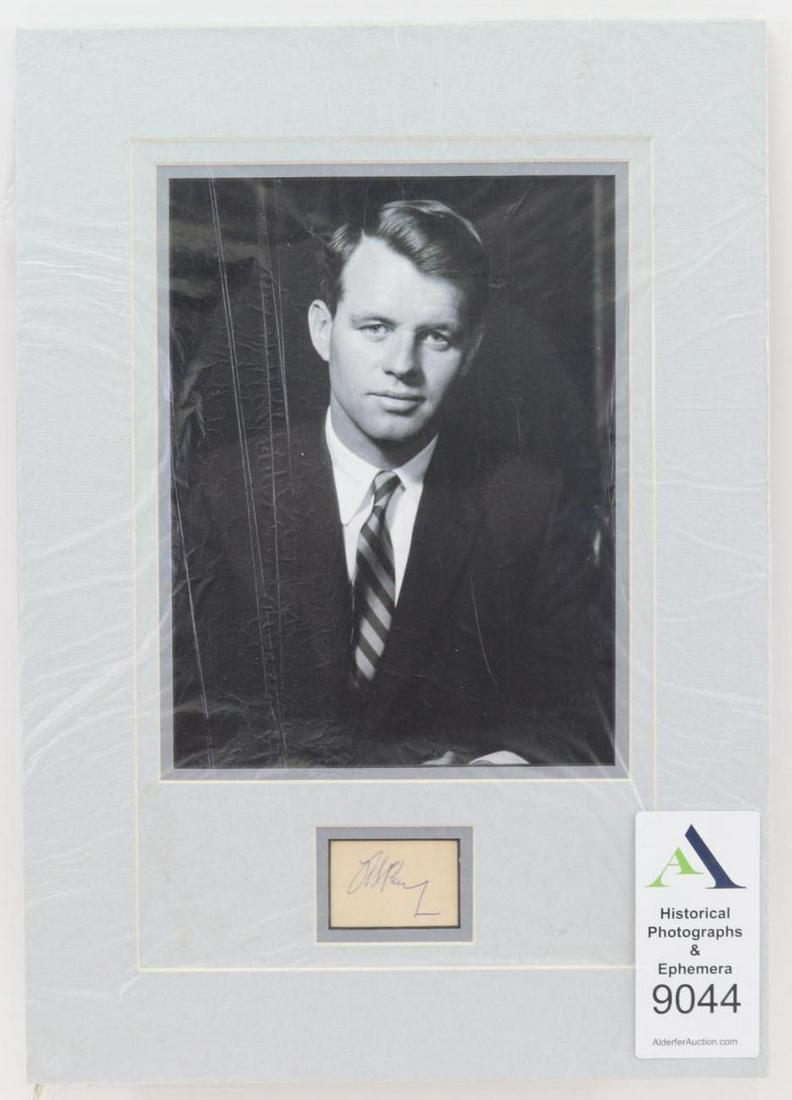 Autograph of Robert Kennedy: Autographed clip signature of Robert F. Kennedy (1925-1968) American lawyer, politician and brother of President John F. Kennedy. Clip signed in blue ball point pen "Robt Kennedy". Clip measures 1.5" 