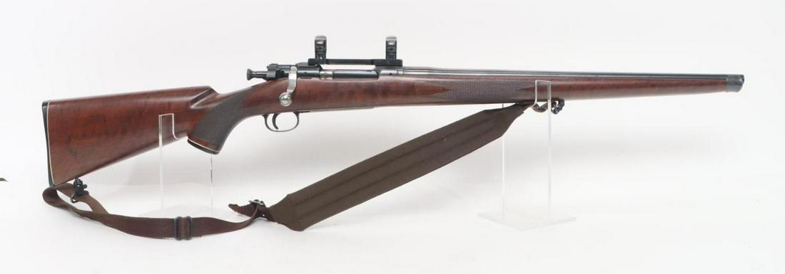 Remington Model 1903 Sporter Bolt Action Rifle: 30-06, 20 1/2" bbl, SN 3141109. 95% blue finish shows average handling, good bore, redfield style scope base and rings mounted with metal shims on front receiver ring, checkered wood mannlicher style 