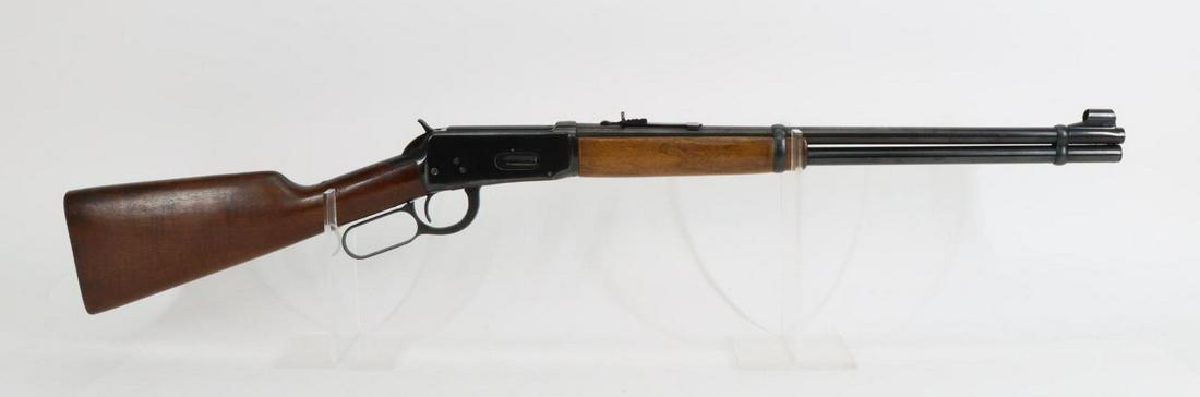Winchester (pre 64) Model 94 Lever Action Rifle: 30-30 Win, 20" bbl, SN 1851572. 90% blue finish shows areas of scattered light freckles, good bore, hooded front sight, wood stock and forearm show average handling. 13"LOP. 6 1/2lb trigger pull, Good