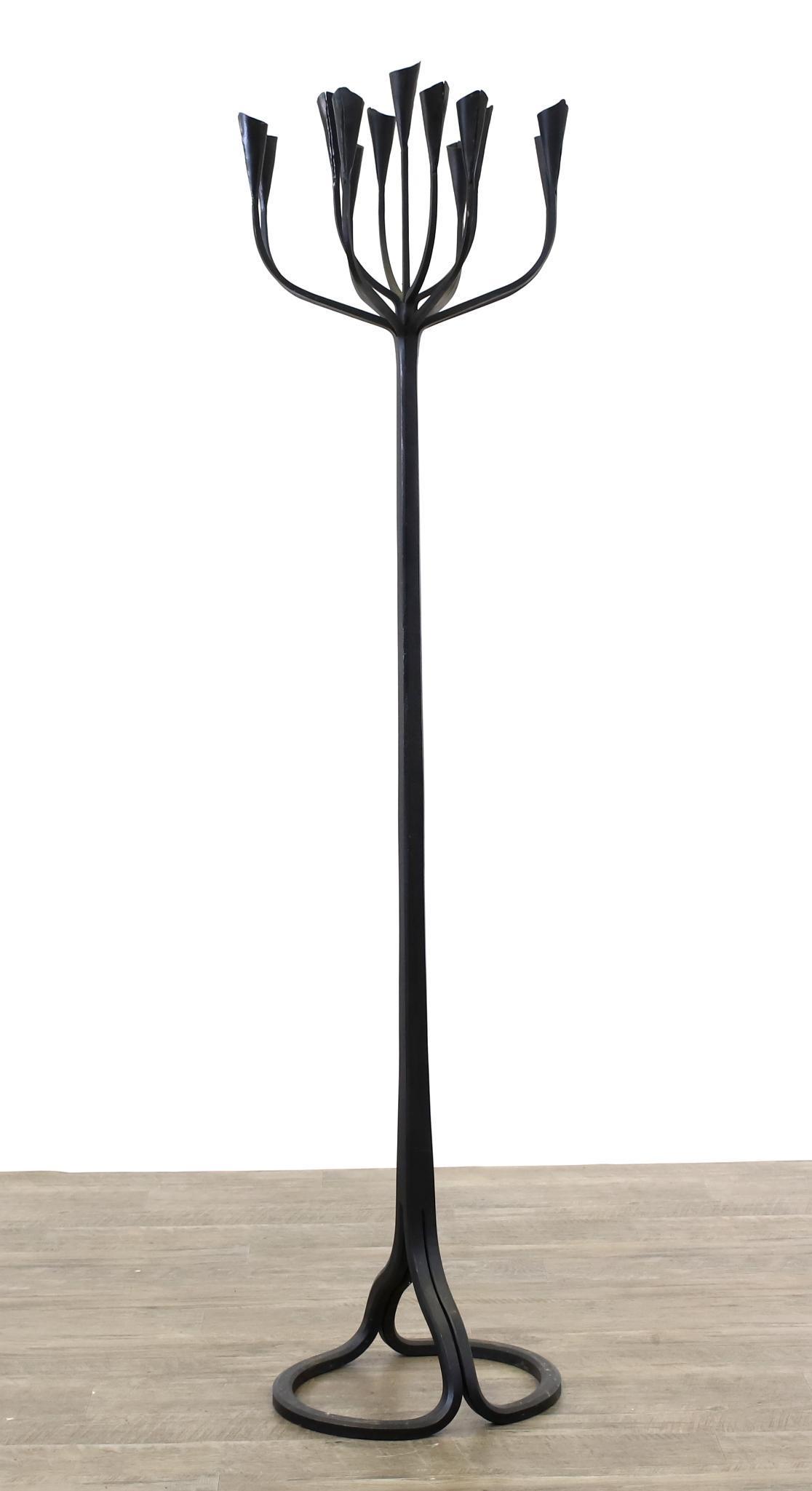 Gregory Litsios Torchiere: Wrought iron 13-light candelabra torchiere, signed by Gregory Litsios, assistant to Albert Paley. 65"h **Please Note: This item is NOT eligible for in-house shipping. Please refer to the terms and con