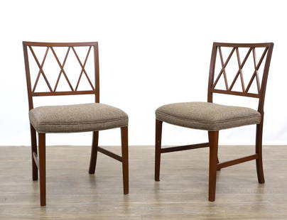 Ole Wanscher and AJ Iversen Dining Chairs for Illums Bolighus: Pair of rosewood bowed x-back side chairs with tapered square front legs and saber back legs joined by stretchers, brass Illums Bolighus plate under the seat. 33"h x 19.5"w x 21"d, seat height of 18"