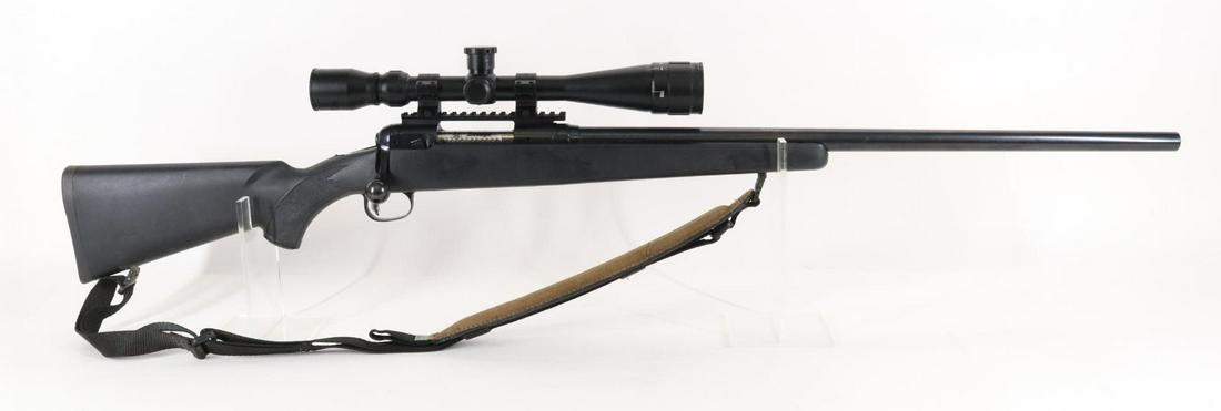 Savage Model 12 Bolt Action Rifle: 223 Rem, 26" heavy bbl, SN G727050. 98% blue finish shows light handling with scattered freckling, good bore, jeweled bolt, BSA Sweet 223 6-18X rifle scope with Duo-plex reticle and clear optics mount