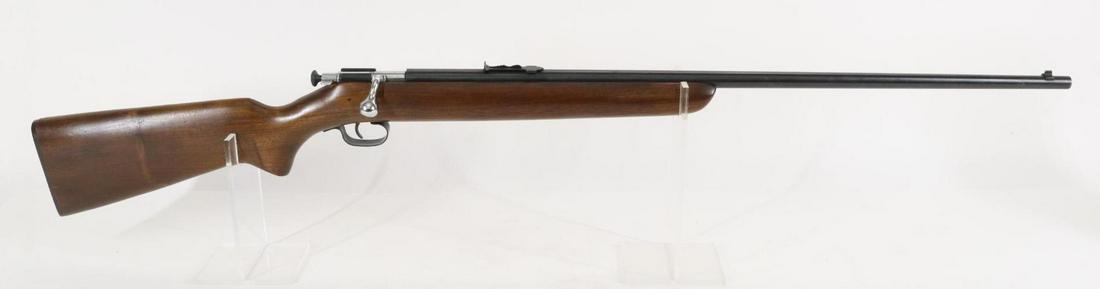 Winchester Model 67 Bolt Action Rifle: 22S,L,LR, 27" bbl, NSN. 95% blue finish shows scattered moderate freckling, good bore, wood stock shows average handling. Good condition. 22-1287 C&R