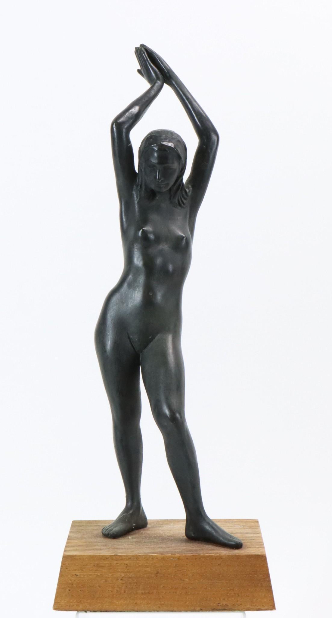 Attributed to Joe Brown (1909 - 1985): Bronze sculpture of a nude female with raised arms, initialed "JB" and dated to the side of the head, and cipher mark to the ankle. 6"h x 8.5"w x 5"d. Plinth 1"h x 9"w x 6"d