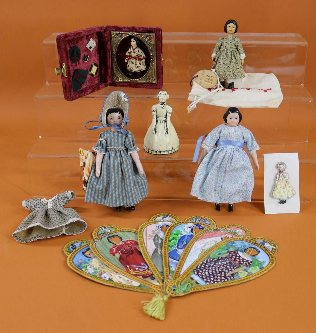 ARTIST DOLL(S).: HITTY Lot. 6 1/4" 1998 Needle sculpted HITTY cloth painted doll by artist Theresa Maugham. 6 1/4" Porcelain shoulderhead HITTY doll signed Theresa/2000. Extra dress. 4 1/4" Wooden "ITTY BITTY" HITTY d