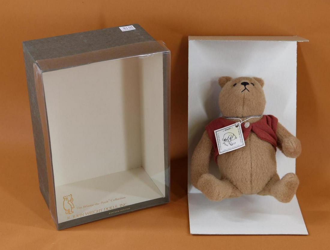 R. JOHN WRIGHT.: The Winnie-The-Pooh Collection. 8" "Pooh" in OB. 1725/2500. Condition: age discoloration on box. Pooh is MINT.