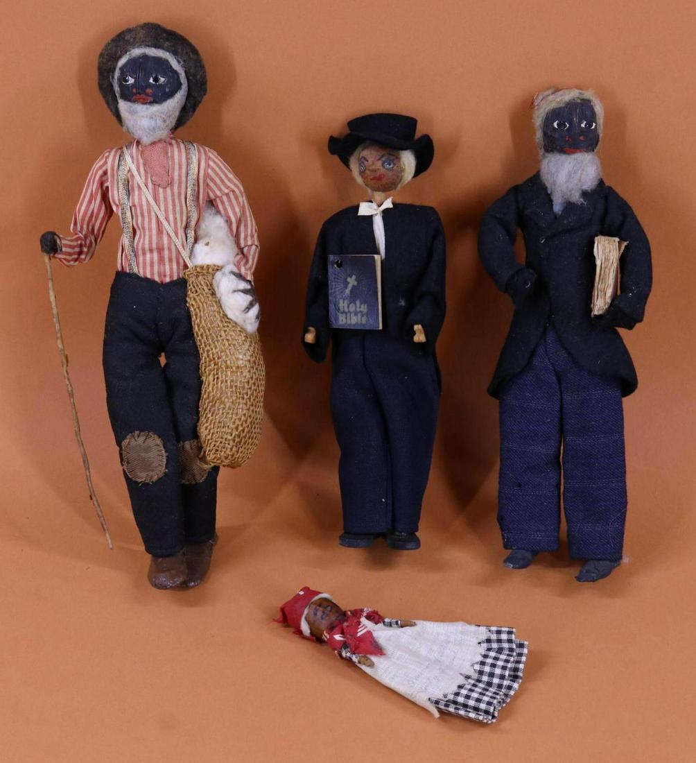 BLACK DOLL(S).: LOT. (4) Nut head dolls. 5" Pecan head. 8 1/2" RARE Hazel nut? head Arkansas' "Little People" Circuit Rider with original tag on back. Pair of walnut head dolls - tagged 11" Loveleigh Novelty "Cotton 