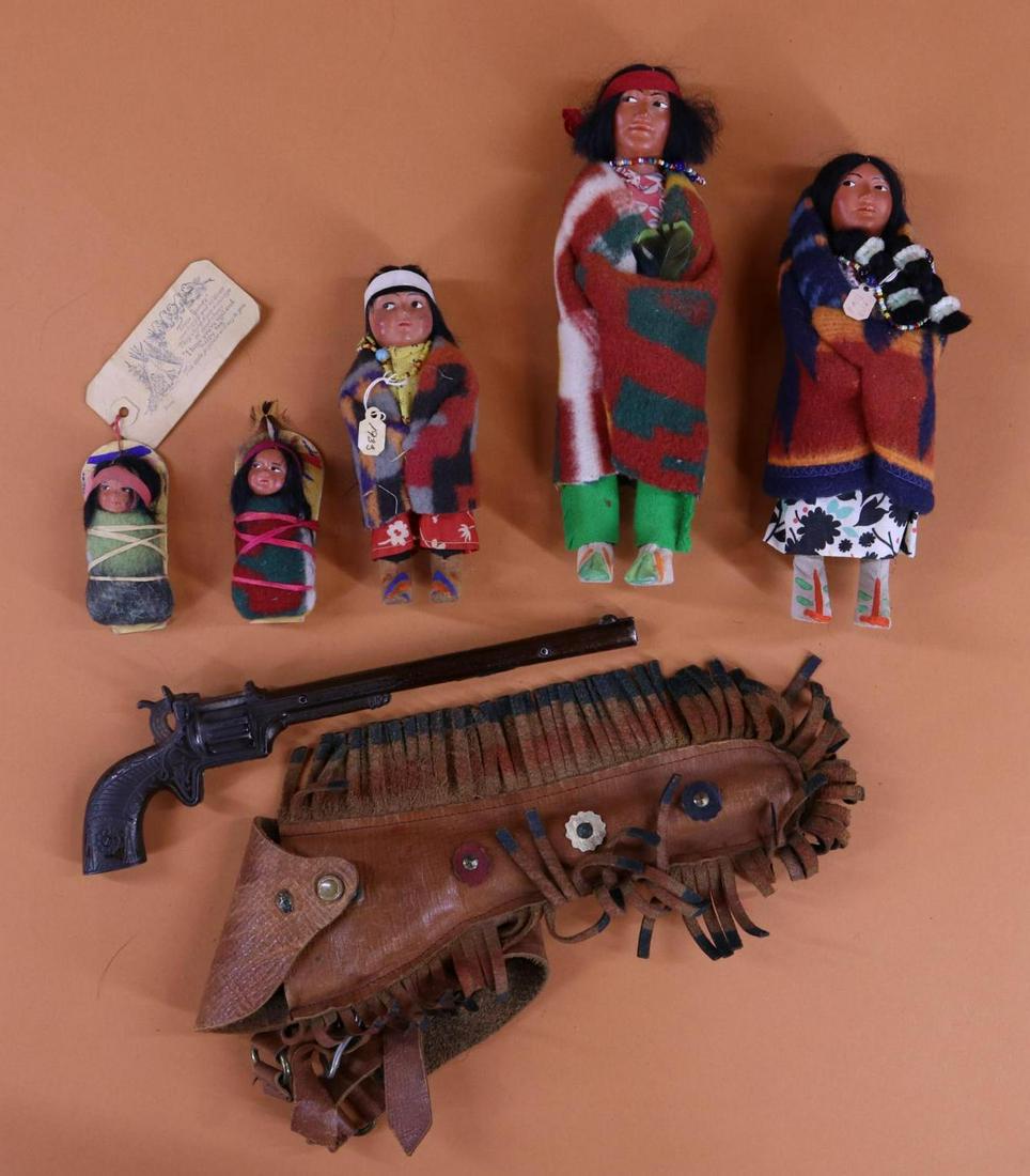 NATIVE AMERICAN DOLL(S).: LOT. (3) Skookum dolls - 6 1/2" (tagged and marked 1933, Running Bear.) The following (2) are unmarked. 9" Flying Bird and 10" male. (2) 3" Papooses on Cradle Boards . These were mailers. ALSO - 1880'
