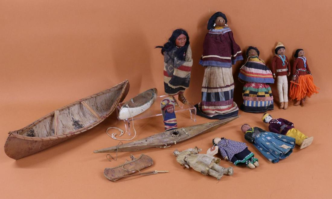 NATIVE AMERICAN DOLL(S).: LOT. 9" Unmarked Skookum doll. 3" Skookum papoose mailer. (4) Navajo dolls - 6 1/2" couple and 8" couple (hair loss). (2) Seminole - 8", 11 1/2". (2) 6" Unmarked. ALSO - (3) Canoes/type: 5", 8", 17" a