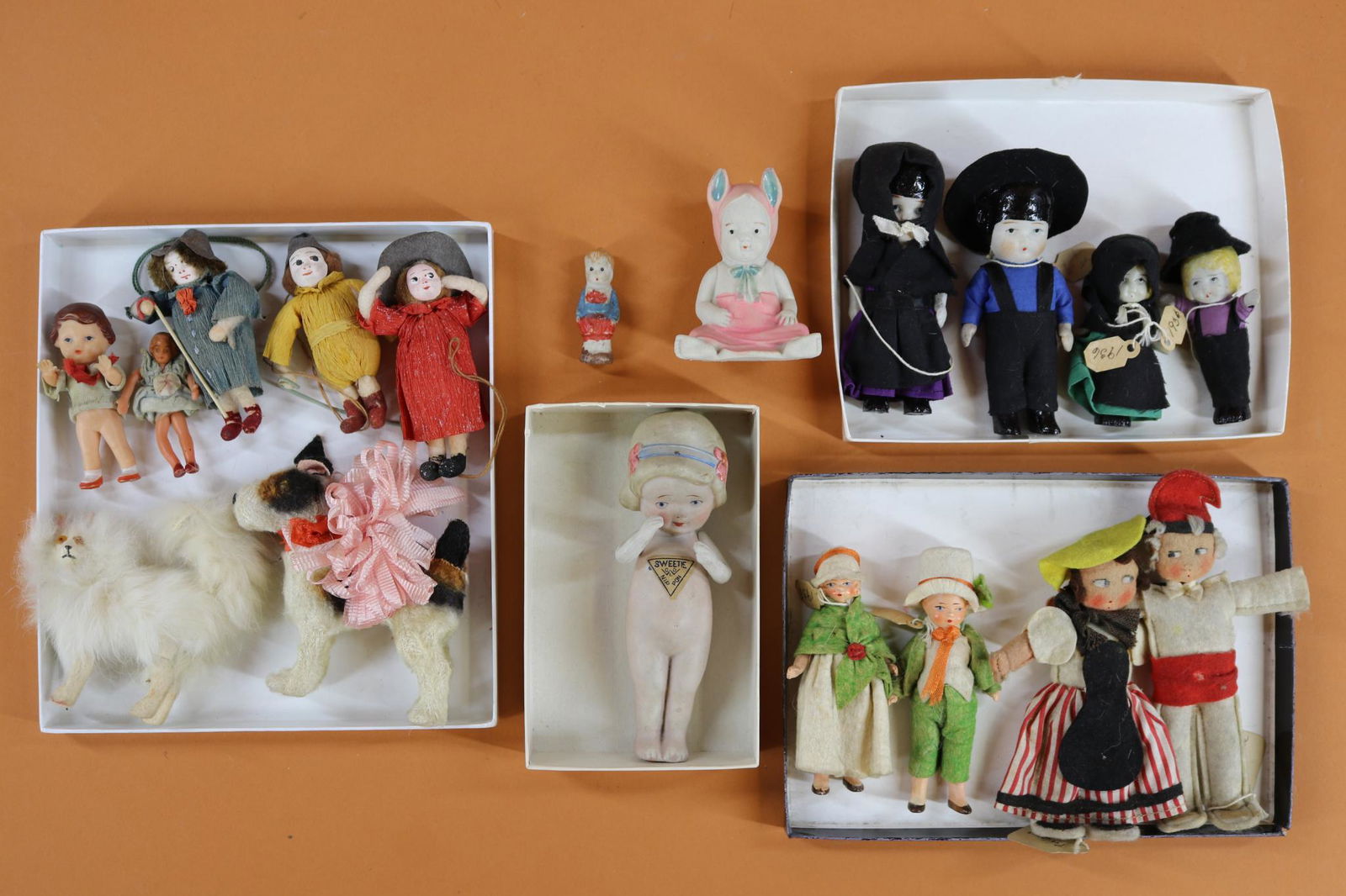 MINIATURES/DOLLS/ANIMALS..: LOT. Dolls - 1938 painted bisques, French felt dolls, 1936 all bisque Amish dolls (different sizes). Bunny doll figurine. NIPPON Sweetie. Cotton batting/papier mache dolls. Animals - fur covered dog w