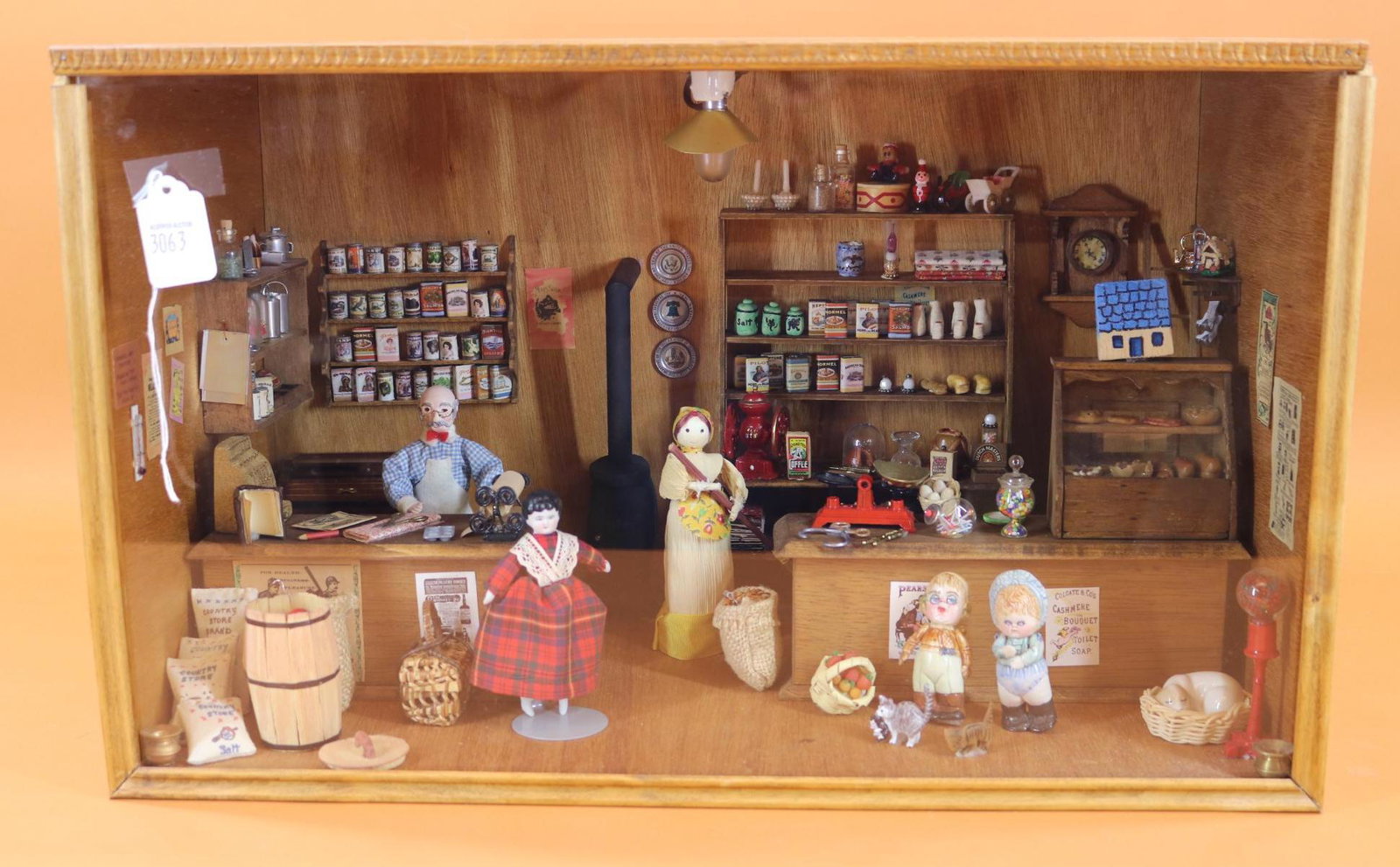 MINIATURES/ROOM BOX.: LOT. Miniatures from the collection of and made/assembled by artist Regina Steele. "General Store". (5) Dolls inc, (2) by artist Gelhardt, corn husk, antique china Lowbrow and dollhouse doll. Many dry