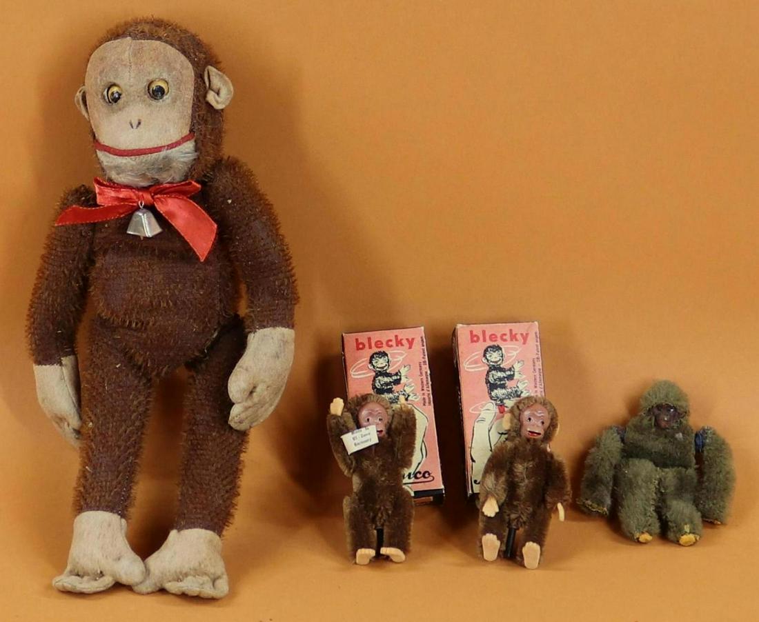 ANTIQUE/VINTAGE ANIMAL(S).: LOT. (4) Brown mohair Monkeys. Pair of 3 1/2" Schuco "Blecky" monkeys tagged Made in US Zone Germany, both in OB. #7305/9. When plunger on rear end is pushed, their tongues stick out. Condition: age l