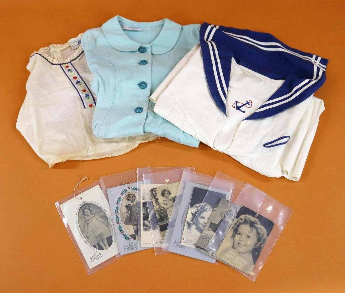 SHIRLEY TEMPLE.: LOT. Provenance: This lot was worn by consignor's mother as a child. (3) Tagged 1930's "A Cinderella Frock Authentic SHIRLEY TEMPLE" outfits. S. Temple STYLE blue/white "sailor dress". S. Temple BRAND