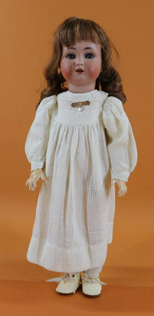 GERMAN BISQUE HEAD DOLL.: 18 1/2" K * R SIMON & HALBIG 403 GERMANY 46 Doll. Blue sleep eyes, open mouth, pierced ears, brown French human hair wig. Papier mache ball jointed body. Dressed in antique white cotton dress. Pin on