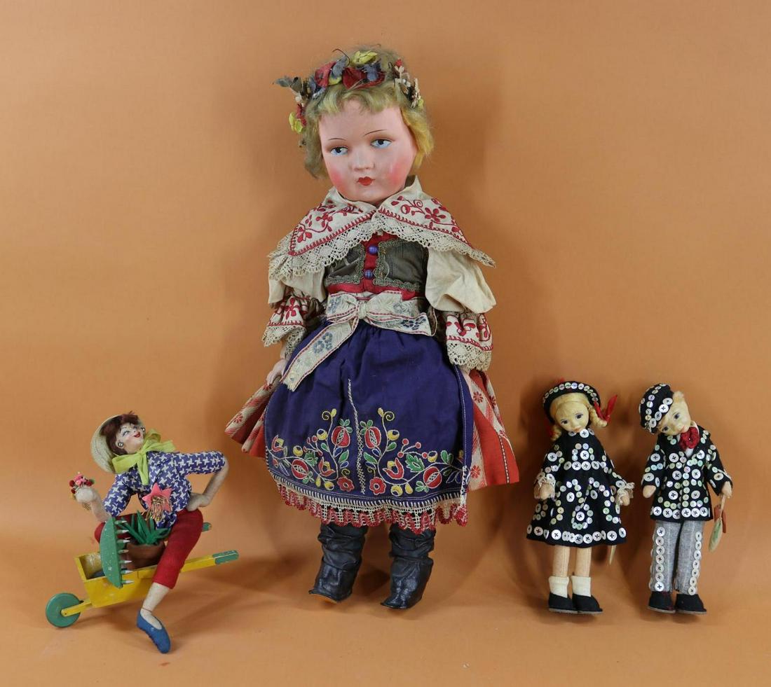 INTERNATIONAL DOLLS.: Lot of (4) dolls. Pair of tagged 8 1/2" Old Cottage (England) "Pearly" dolls, boy & girl. (Necks are bent.) 20" Polish girl with papier mache face, cloth body, celluloid hands, mohair wig. 8" Klumpe (