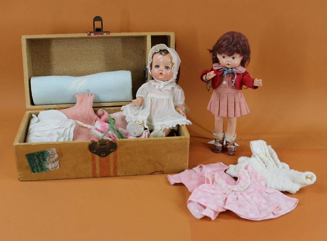 EFFANBEE PATSY FAMILY DOLLS.: Pair of dolls, trunk of clothing. BABYETTE and PATSYETTE. 8 1/2" Babyette - blue sleep eyes, wearing vintage clothing. 12 1/2" Trunk has a variety of assembled clothing to fit this doll. Condition: cr