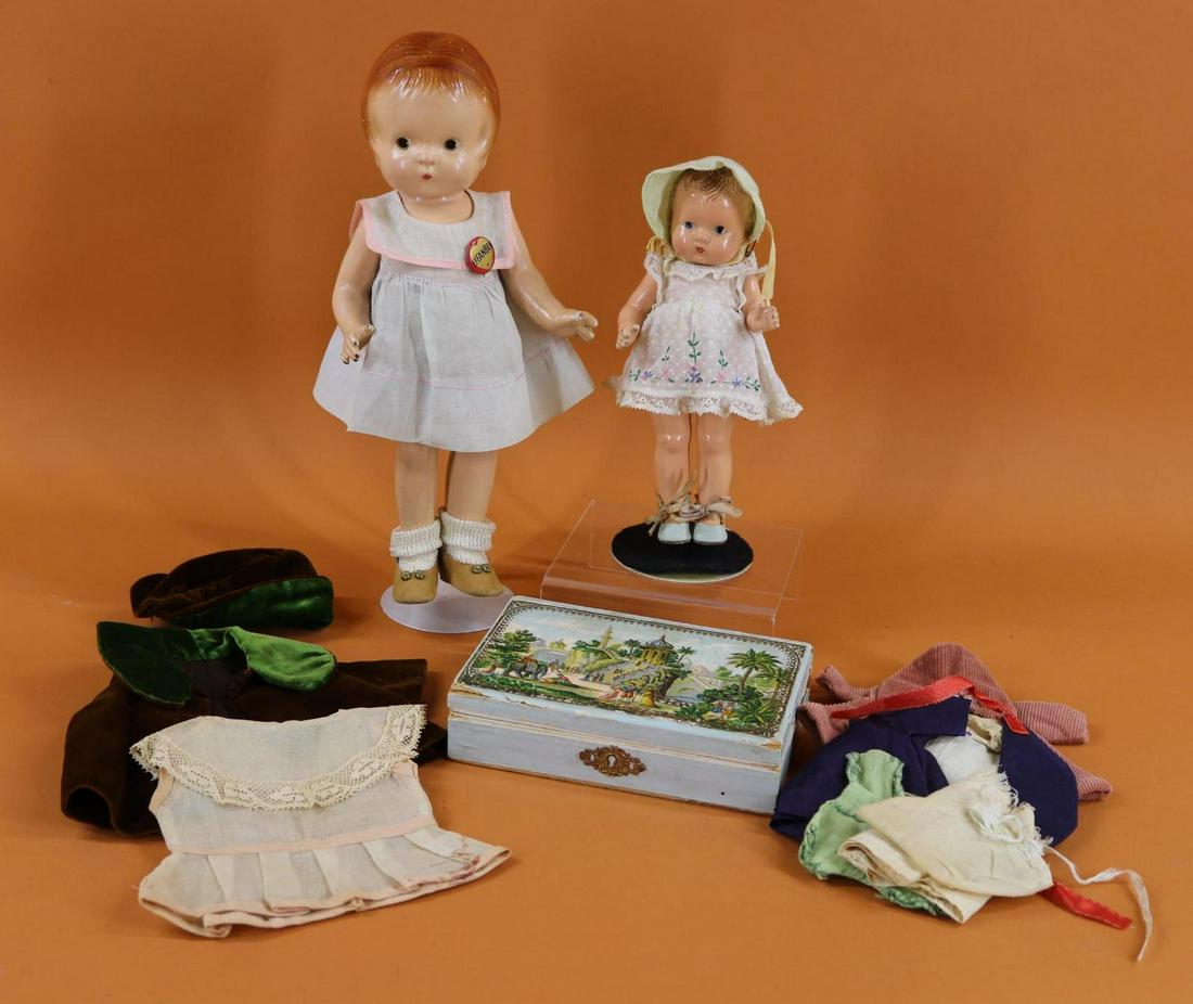 EFFANBEE PATSY FAMILY DOLLS.: Pair of dolls. BABY TINYETTE and PATSY JR. 7 1/2" Baby Tinyette - has painted blue eyes and brown hair. Comes with box of commercial and handmade clothing, oilcloth shoes. 11" Patsy Jr - has painted b