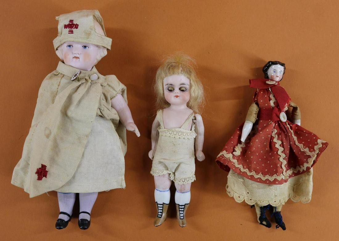 ALL BISQUE/CHINA DOLLS.: LOT of (3) dolls. (2) ALL BISQUE - 6" Unmarked doll with brown sleep eyes, closed mouth, mohair wig, painted bootines, socks. 5 Pc. body. Wearing a teddy. Condition: left leg opening of torso has been