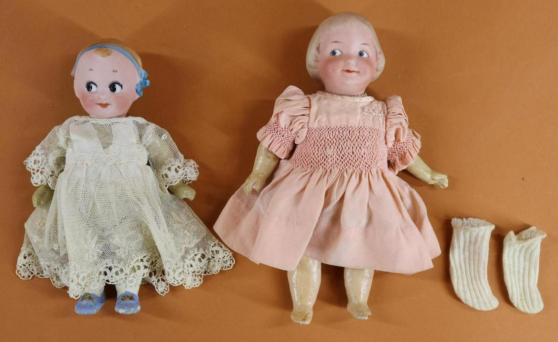 GOOGLY EYE DOLL(S).: Pair of dolls with painted side glance eyes. Both dolls have solid domes with painted hair. 5 Pc. papier mache toddler bodies. Doll 1) 6 1/2" P. (Goebel crown symbol) G/W 12/0X GERMANY. Black eyes, cl