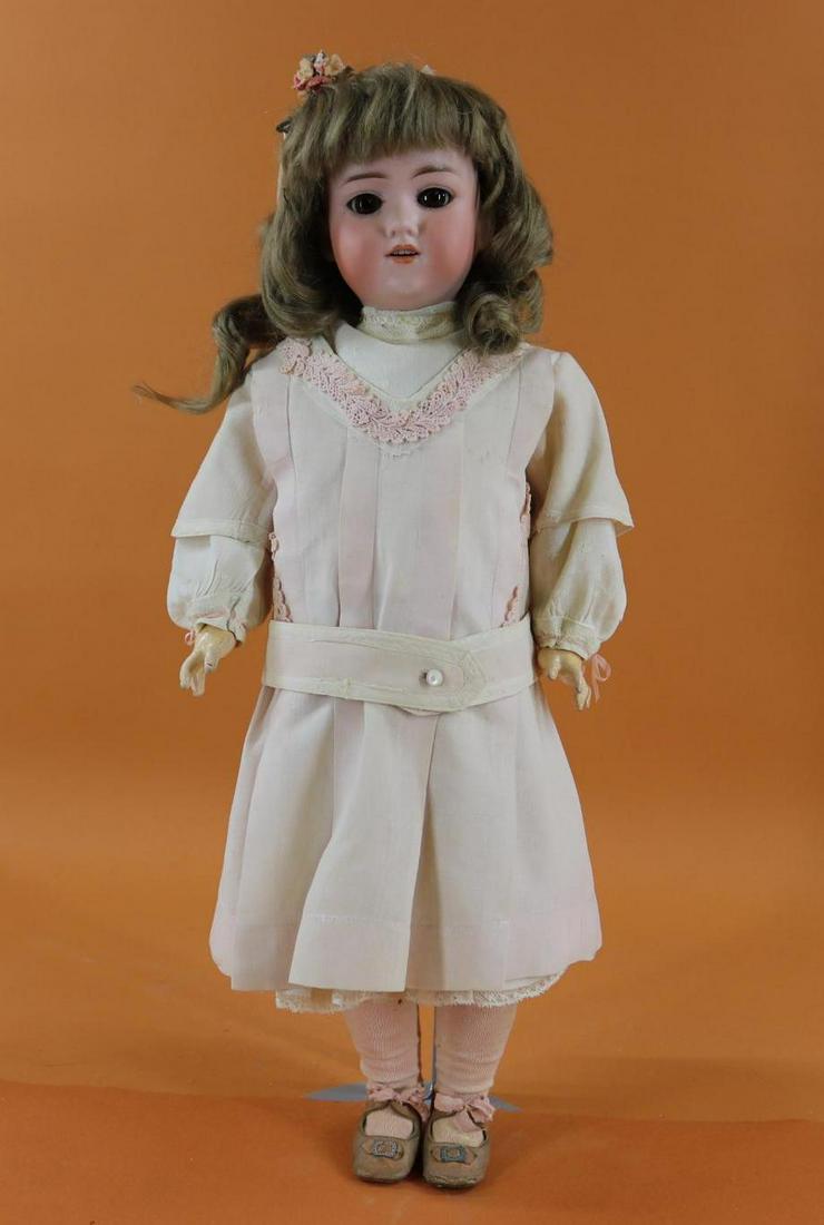 GERMAN BISQUE HEAD DOLL.: 20" MADE IN GERMANY ARMAND MARSEILLE 390 A.4.M. doll. Brown sleep eyes, open mouth, long curly brown mohair wig. Papier mache ball jointed body. Dressed in all antique cotton clothing - pale pink plea