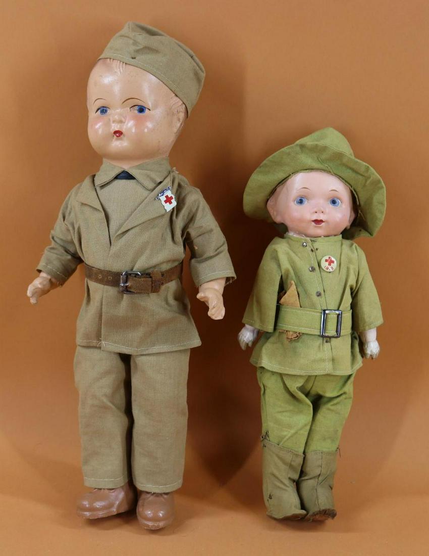 MILITARY DOLL(S).: Pair of all original soldier dolls. 12 1/2" (Mark illegible) doll with composite head, painted hair and features. Composition lower arms, cloth body. Dressed in WWI uniform of either England or Austra