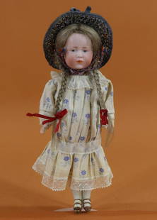 ANTIQUE BISQUE HEAD DOLLS, 12" UNDER.: 8 1/2" K * R 101 21 Character doll (Marie). Painted features with blue eyes. Tosca mohair braided wig. 5 Pc. papier mache flapper style body with painted two strap brown heeled shoes, socks. Dressed