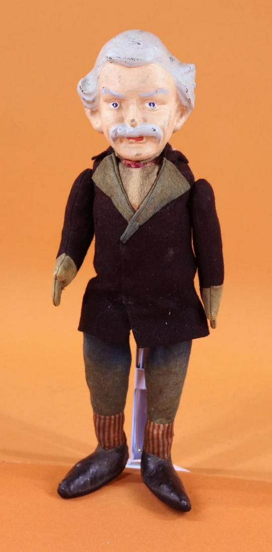 HISTORICAL FIGURES.: 12" German Portrait doll believed to be "Mark Twain". (Pen name of Samuel Langhorn Clemens, 1835-1910.) U.S. Author and Humorist. Papier mache head with molded, painted features and hair. 5 Pc. felt b