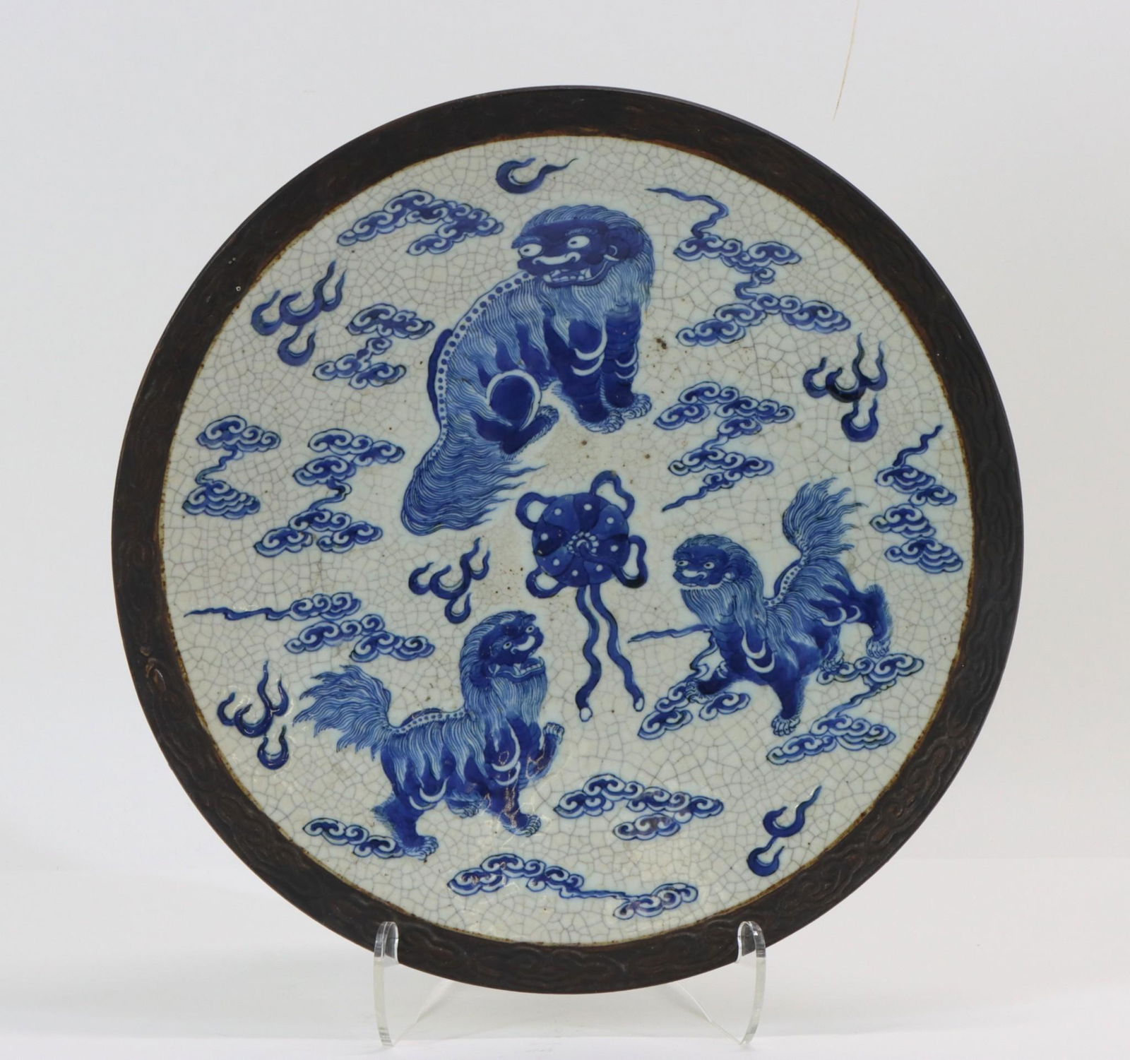 Chinese Crackle Glaze Charger: Foo dog trio in an ethereal setting on crackle glaze celadon ground with unfinished rim, incised Chenghua mark. 13.5"w **Please Note: This item is NOT eligible for in-house shipping. Please refer to t