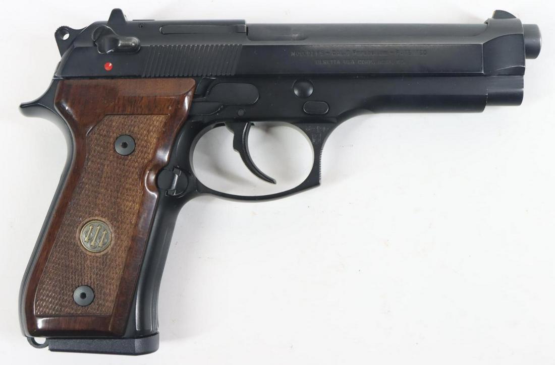 Beretta 92FS Semi Automatic Pistol: 9mm, 4 7/8" bbl, SN E31001Z. 98% blue finish shows light handling, very good bore, checkered wood grips show light handling with a small nick on front edge of left scale, 7-15 rnd magazines, cleaning 