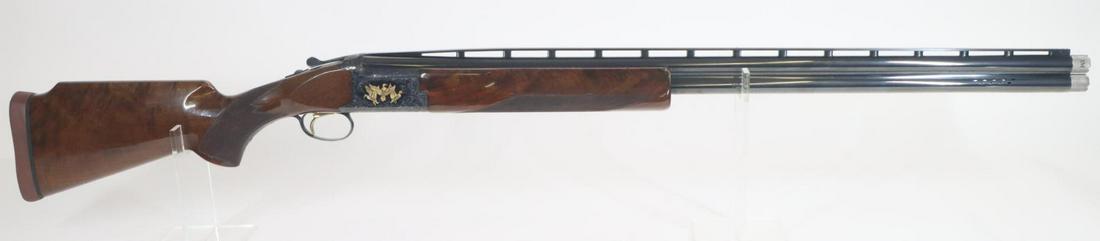Browning (Japan) Citori Grade 6 Over Under Shotgun: 12Ga. 32" bbls, 2 3/4" chambers, IM/LF choke tubes, SN 16203NM463. 98% blue finish shows average handling with a few scattered light freckles and faint scratches, good bores, vent rib with center bead