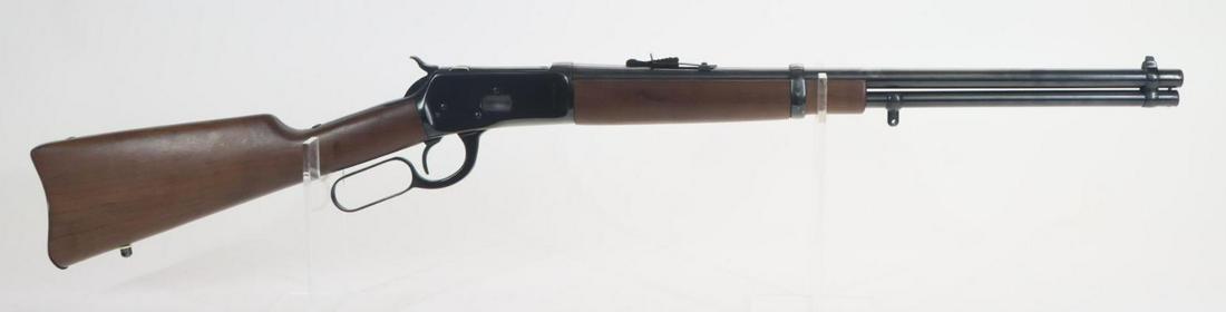 Rossi R92 Lever Action Rifle: .357 Mag/38 special, 20" bbl, SN K051844. 90% blue finish shows average handling with areas of light freckling, good bore, left side of receiver has bronze Cougar medallion and steel saddle ring, wood