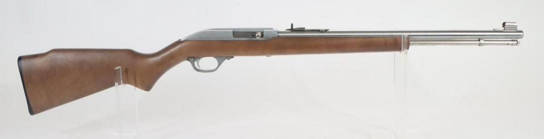 Marlin Model 60SB Semi Automatic Rifle: 22LR, 19" bbl, SN MN29653B. Stainless finish, good bore, day glo hooded front sight, wood stock shows average handling. Good condition. 22-1485