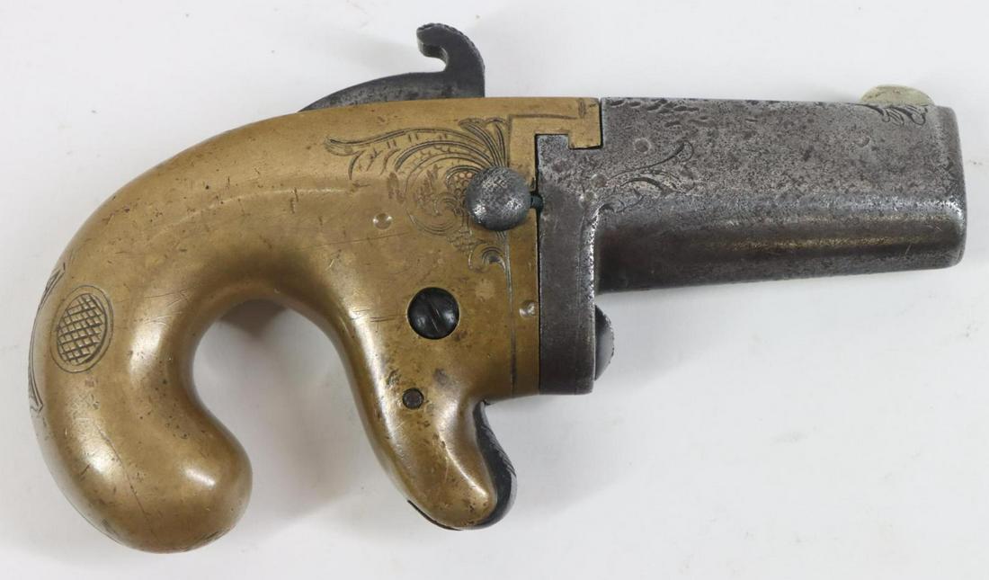 Rare Early National Arms Co No 1 Derringer Pistol: .41 Rim Fire, 2" teardrop barrel, SN 183. Gray patina on engraved barrel, fair bore, top barrel flat marked in one line NATIONAL ARMS Co. bottom of barrel marked in one line PAT. FEB 24 1863, brass fr