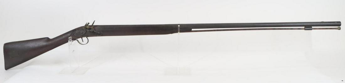 Antique Flintlock Fowler: 12Ga, 43 1/4" bbl, NSN. dark brown patina, fair bore, octagon to round barrel with single wedding band transition, engraved lock holds on half and full cock, wood ramrod, woodstock shows average handl