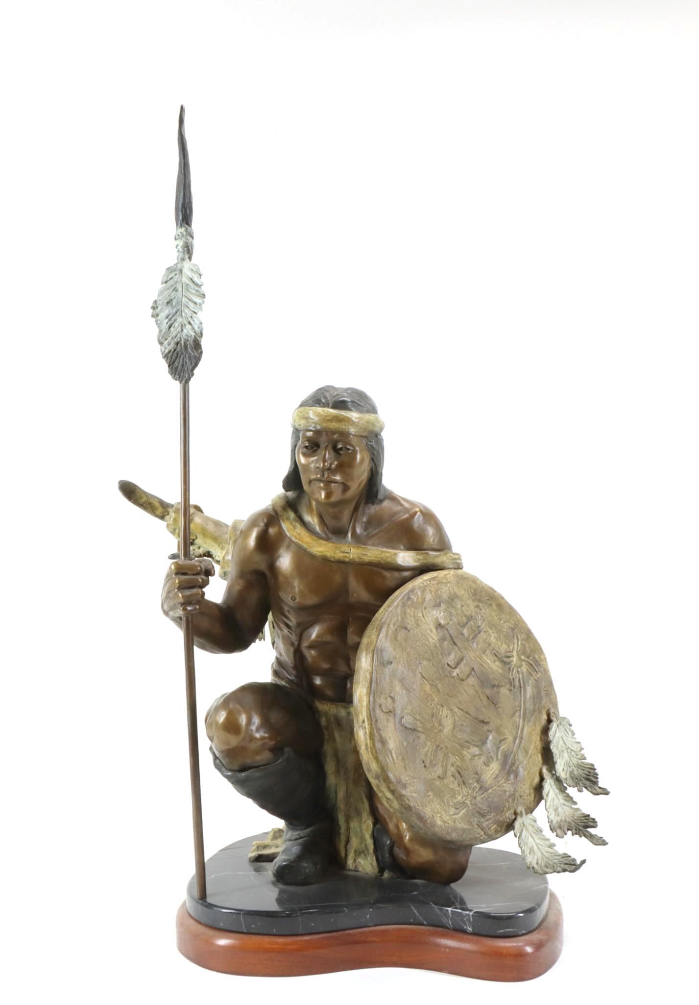 Marie Barbera (b. 1936): Patinated and painted bronze sculpture titled "Apache Scout", depicting a squatting Native American warrior, mounted to a marble base on a wooden plinth, signed en verso and numbered 8 of 20, also wit