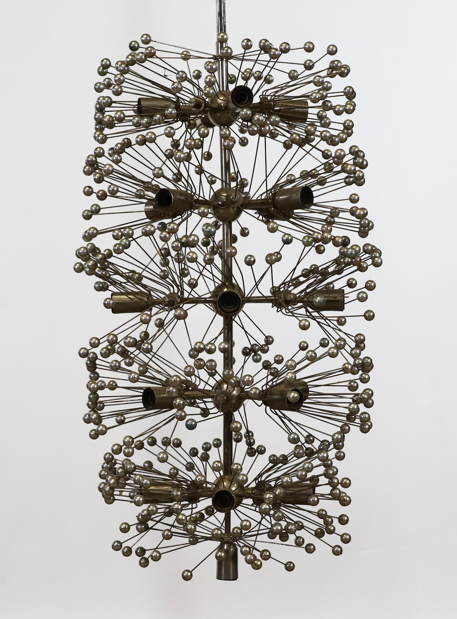 Tall Sputnik Chandelier: Manner of Jonathan Adler for Robert Abbey, polished nickel and steel, 21-light hanging tall pendant, with balls on steel wire, unmarked. The steel wire pieces need adjustment, some are bent, and there