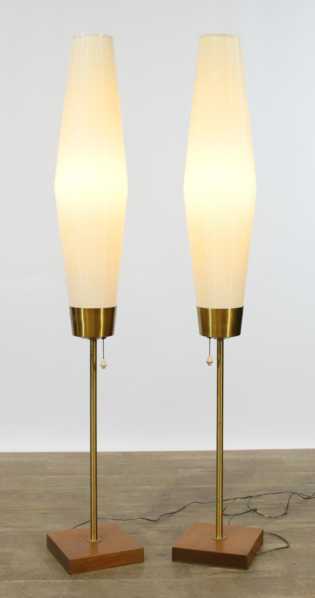 Yasha Heifetz for Rotaflex Floor Lamps: Brass and mahogany with spun cellulose acetate shades, pair, unmarked. In working condition. 56.5"h **Please Note: This item is NOT eligible for in-house shipping. Please refer to the terms and condit