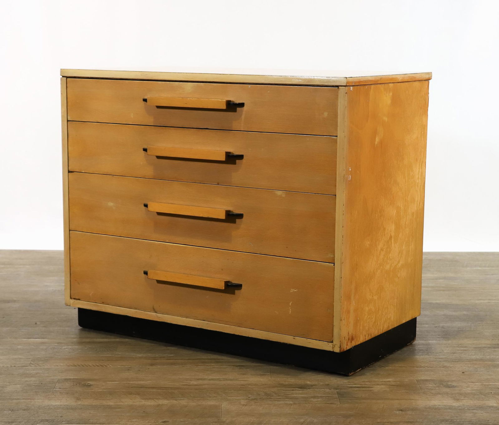 Eliel Saarinen for John Stuart FHA Modular Furniture: "Flexible Home Arrangements" birch veneer chest with four graduated drawers, labeled for John Stuart. Scratches and other surface wear. 30"h x 36"w x 21"d **Please Note: This item is NOT eligible for