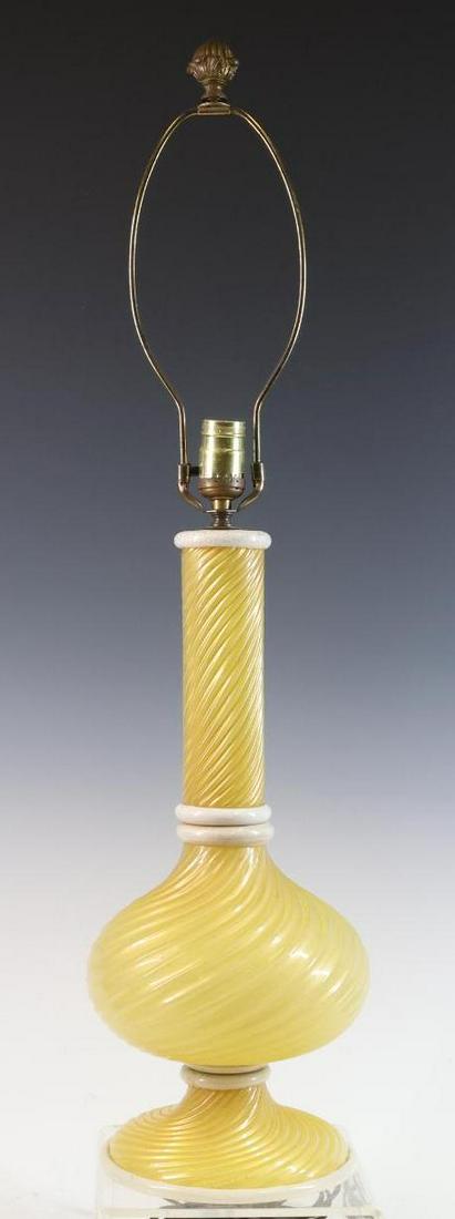 Barovier and Toso Murano Art Glass Lamp: Italian blown glass taple lamp, alabastro yellow with rigadin swirl and gold aventurine decoration, paper label to the foot. In working condition. 33”h x 8"w **Please Note: This item is NOT elig