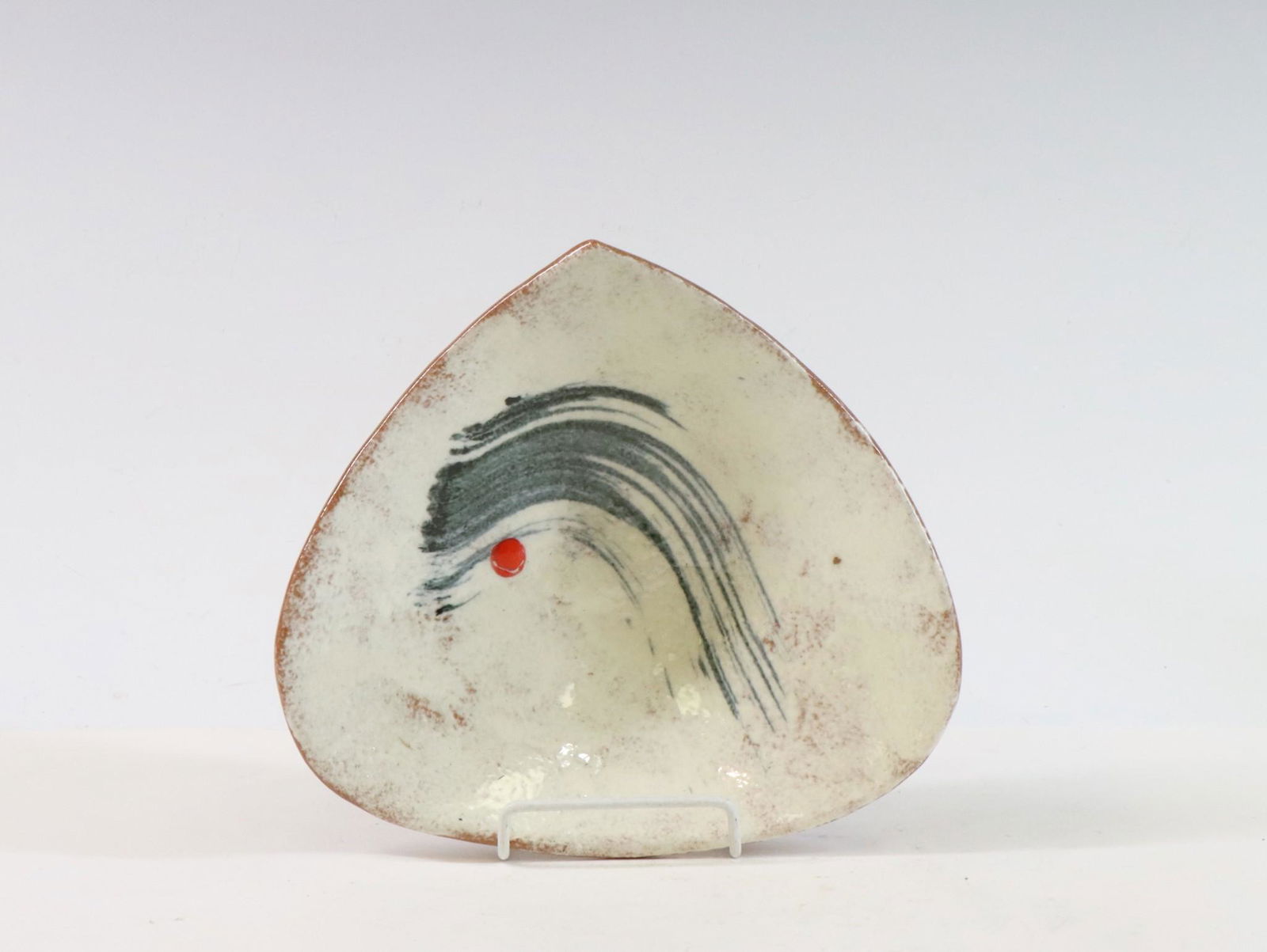 LaGardo Tackett Studio Pottery: LaGardo Tackett studio pottery, unmarked. Earthenware rounded three sided shallow bowl. White glaze with abstract decoration. 8.75" length x 8"w **Please Note: This item is NOT eligible for in-house s