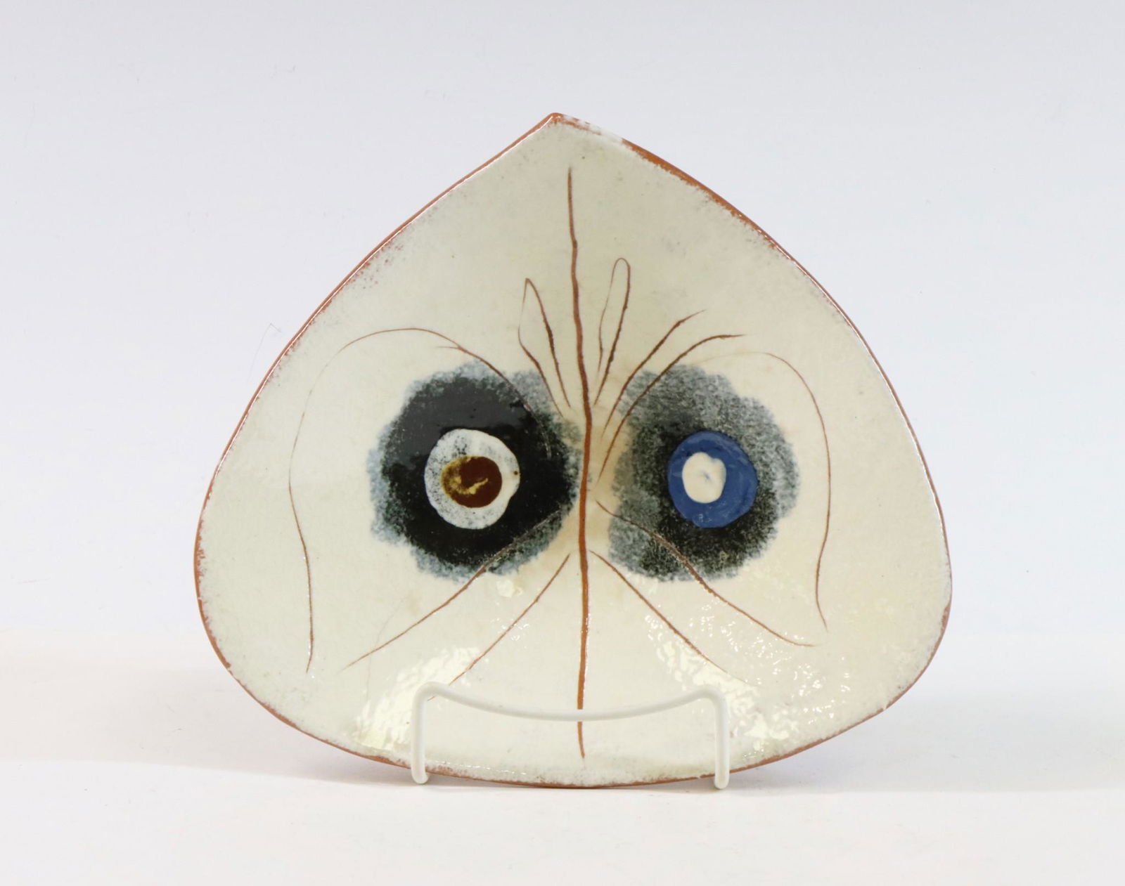 LaGardo Tackett Studio Pottery: LaGardo Tackett studio pottery, unmarked. Earthenware rounded three sided shallow bowl. White glaze with abstract decoration. 8.75" length x 8"w **Please Note: This item is NOT eligible for in-house s