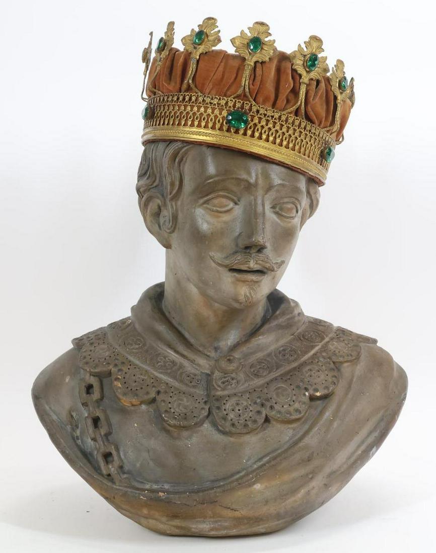 Terracotta Bust of a Young Man: Sculpture of a young man in Renaissance clothing, unmarked, with a replica of a crown. 19.5"h x 15"w x 10"d **Please Note: This item is NOT eligible for in-house shipping. Please refer to the terms an