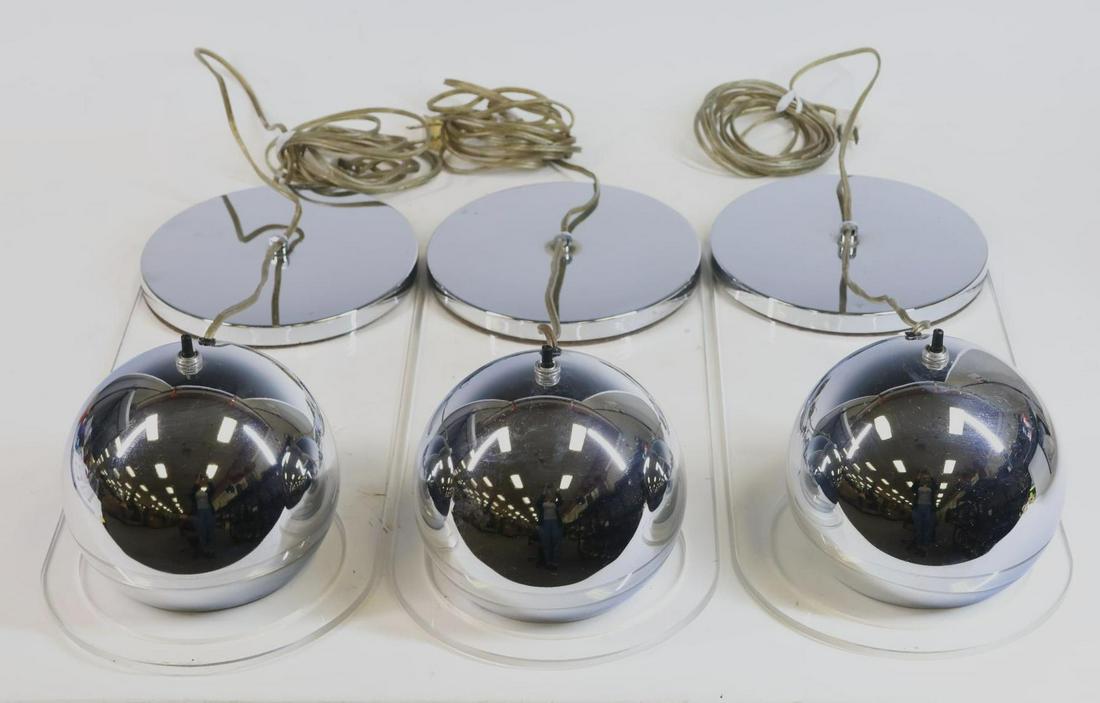 Raymor No. 7 Piano Lamps: Chrome and lucite with white enameled reflectors, set of (3), unmarked. In working condition. Some light scratches and other minor surface wear. 6”h x 7.5”w x 19”d