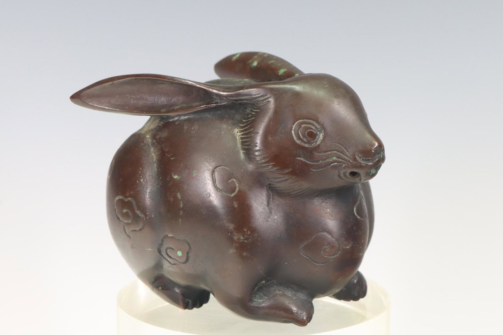 Japanese Bronze Rabbit Censer: Bronze censer in the form of a sitting rabbit, with removable pierced cover and holes in the nose and mouth, unmarked, most likely Meiji. Replaced pin. 3.5"h x 4.5"w x 3.5"d